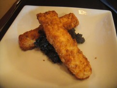 Sesame Baked Feta -- Premium feta crusted with sesame seeds baked and served with olive tapenade